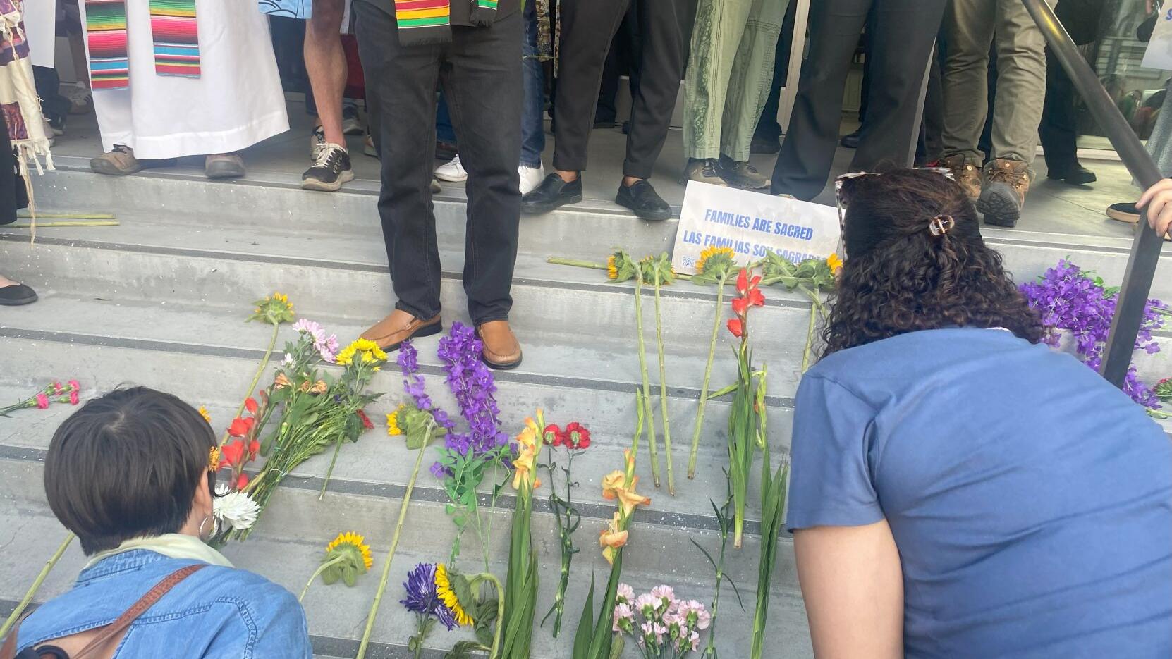 ‘We come with flowers’: Faith leaders host prayer vigil for family unity at the Federal Building